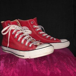 Red traditional high top converse.